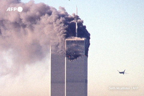 The second plane approaches the World Trade Center - Seth McAllister - AFP