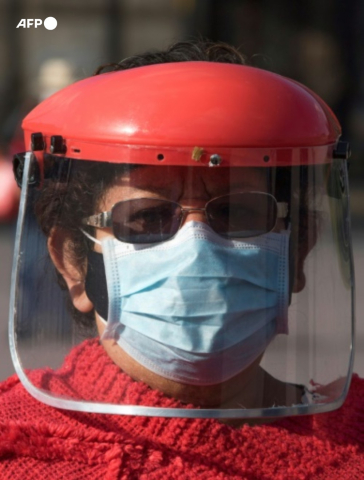 Woman with anti-Covid-19 mask and visor, Mexico, July 2020 - Claudio Cruz - AFP